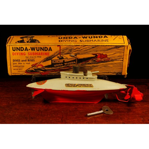 7092 - A 1940's Sutcliffe Model tinplate and clockwork Unda-Wunda diving submarine, grey and red body with ... 