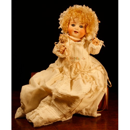 7104 - A Heubach Koppelsdorf (Germany) bisque head and painted composition bodied doll, the bisque head ins... 