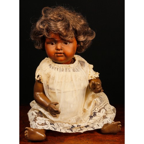 7106 - An Armand & Marseille (Germany) bisque head and painted composition black doll, the painted bisque h... 