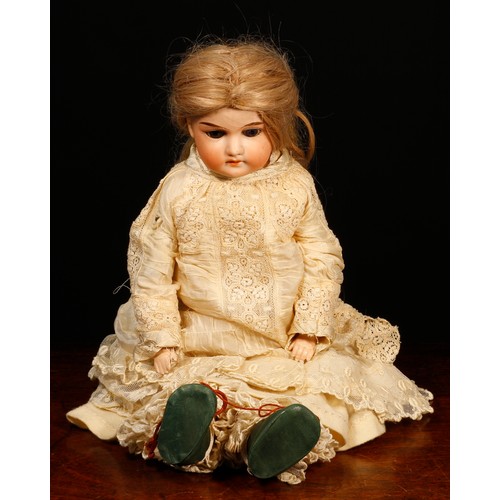 7108 - An Armand & Marseille (Germany) bisque shoulder head and partially kid leather bodied doll, the bisq... 