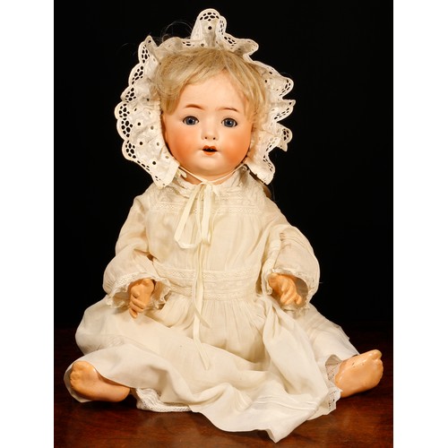 7110 - A Heubach Koppelsdorf (Germany) bisque head and painted composition bodied doll, the bisque head ins... 