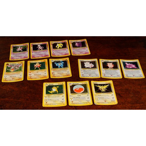 7137 - Pokemon, Pokemon Trading Cards – a collection of ungraded holographic foil trading cards, from the P... 