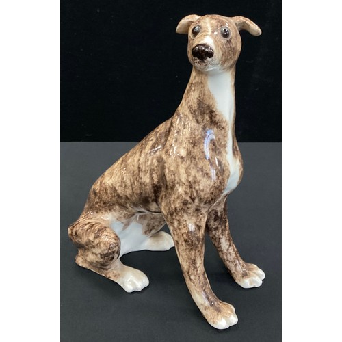 6 - A Winstanley pottery model of a Seated Brindle Greyhound, numbered 5, 25.5cms high