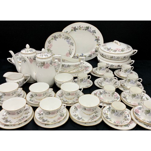 77 - A Royal Worcester ‘June Garland’ table service for six including; three lidded tureens, six tea cups... 