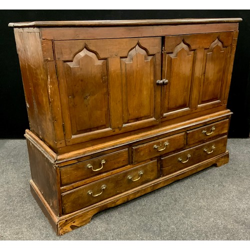 173 - An 18th century and later oak mule chest/cabinet, 108cm high x 137.5cm wide x 48cm deep.