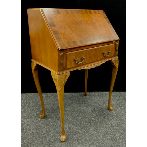 185 - An early 20th century mahogany crossbanded walnut bureau, c.1930