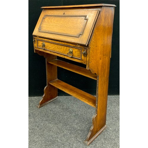 186 - An Arts and Crafts period oak bureau bookcase, c.1920