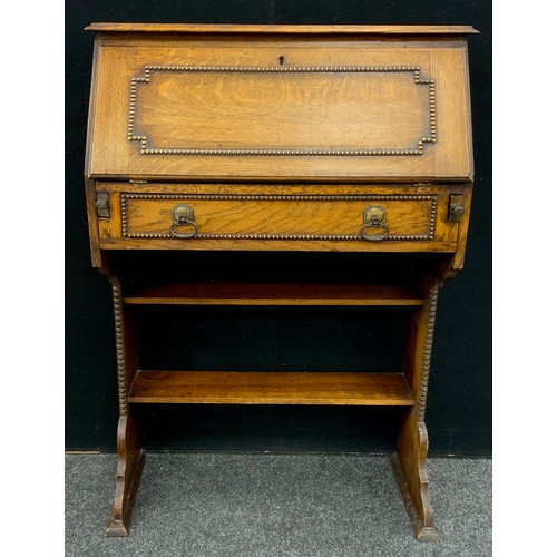 186 - An Arts and Crafts period oak bureau bookcase, c.1920