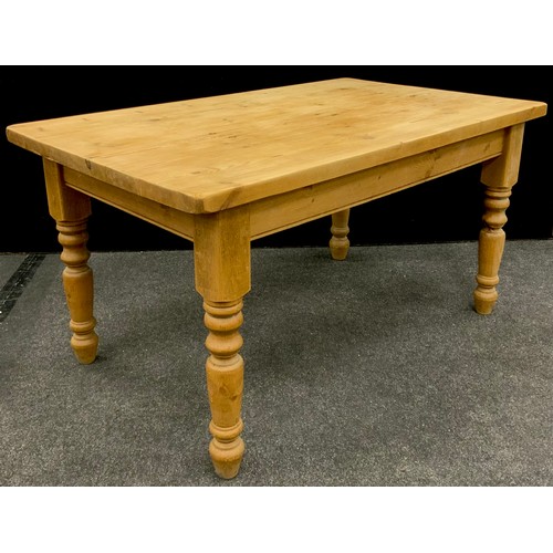 197 - A pine farmhouse kitchen table, 78.5cm high x 149cm long x 90.5cm wide.