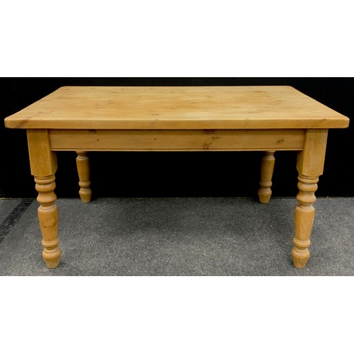 197 - A pine farmhouse kitchen table, 78.5cm high x 149cm long x 90.5cm wide.