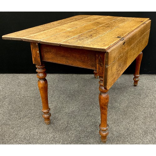 208 - A George III oak plank-top, drop- leaf, kitchen table, 73.5cm high x 109.5cm x 63cm (106cm with leav... 