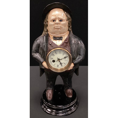 262 - A cast iron novelty mantel clock, cast as John Bull, automaton eyes, 41cm high