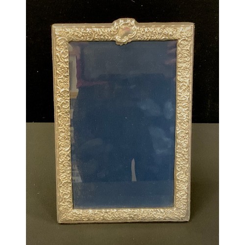 279 - A 20th century silver arch top photograph frame, 27cm x 18cm