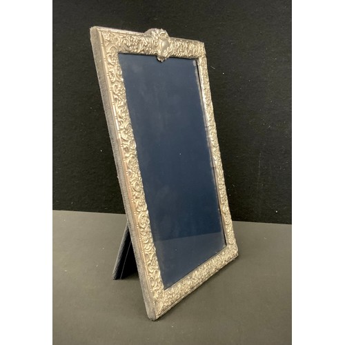 279 - A 20th century silver arch top photograph frame, 27cm x 18cm