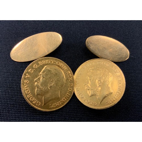 305 - A pair of 1912 half sovereign cufflinks, welded chains and oval yellow metal returns, 12.9g gross