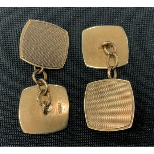 310 - A pair of 9ct gold engine turned panel cufflinks, 5g gross