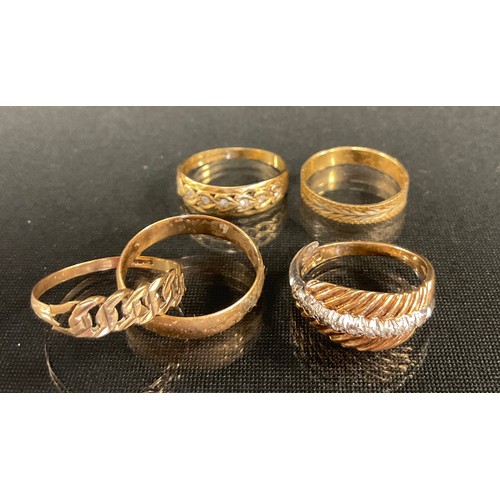 314 - Rings - a 9ct gold cz dress ring, others wedding band, two tone ring etc, 9.4g gross (5)