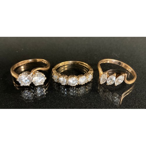 315 - Rings - a 9ct gold cz two stone dress ring,  others, 6.8g gross (3)