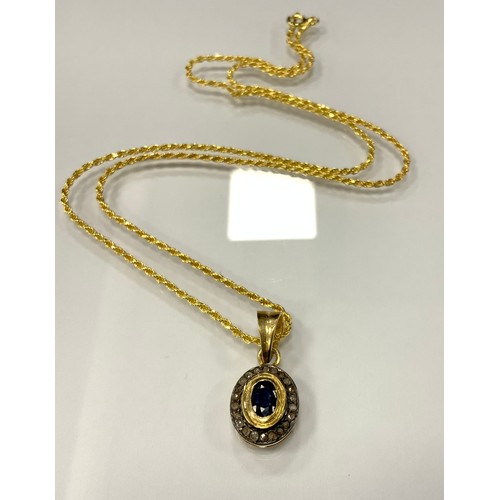 328 - A Victorian style oval sapphire and rose cut diamond pendant necklace, gold and white metal coloured... 