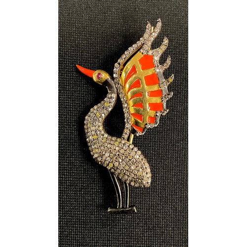 330 - An Art Deco style diamond, ruby and enamel pendant brooch, as a fanciful wading bird, with orange be... 