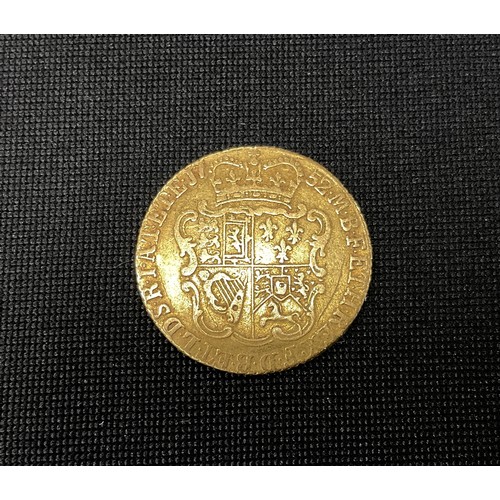 368 - A George II half guinea gold coin, 1752, crowned quartered shield 4.1g