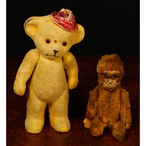 7145 - Juvenalia - a Schuco (Germany) brown mohair 'Yes/No' novelty miniature Monkey, wearing a pair of spe... 