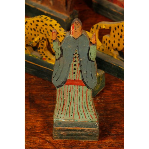 7147 - Folk Art & Juvenalia - an early 20th century painted wooden Noah's Ark, the hinged cover housing a c... 