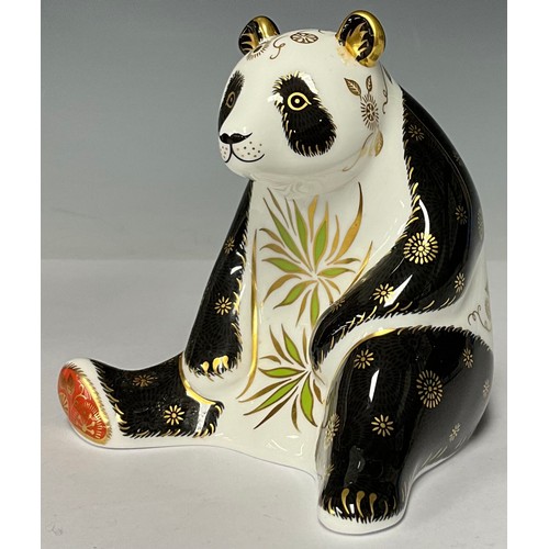 3033 - A Royal Crown Derby paperweight, Giant Panda, 12cm high, gold stopper, 12cm high, printed marks in r... 