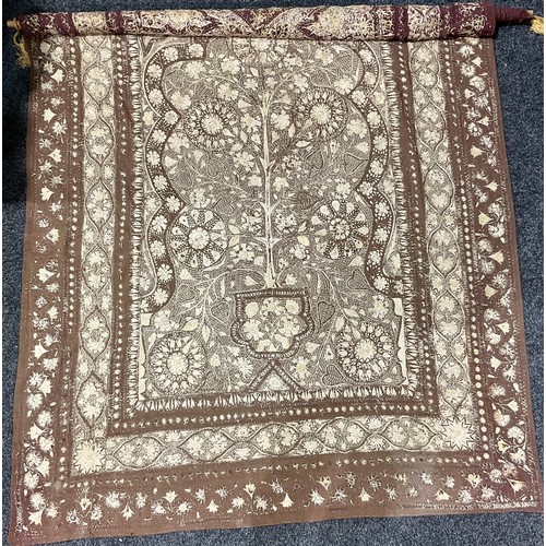 449 - A Middle Eastern needlework wall hanging, worked with flowers and geometric motifs, 250cm x 150cm