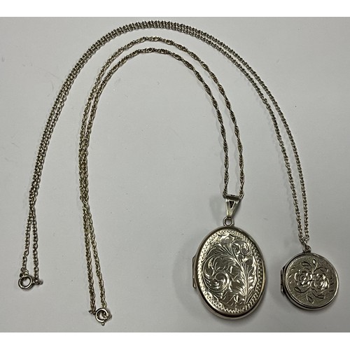 467 - Jewellery - a silver locket, Sheffield, 1979, 14.3G gross; another, sterling silver, 8.4g gross (2)