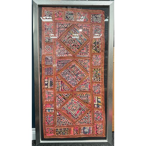 506 - An Indian hand made woollen and cotton mat/wall hanging, some small mirrored glass inclusions, early... 