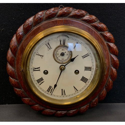 24 - A Marine/shipping interest carved oak cased bulk head or wall time piece, cream dial, eight day move... 