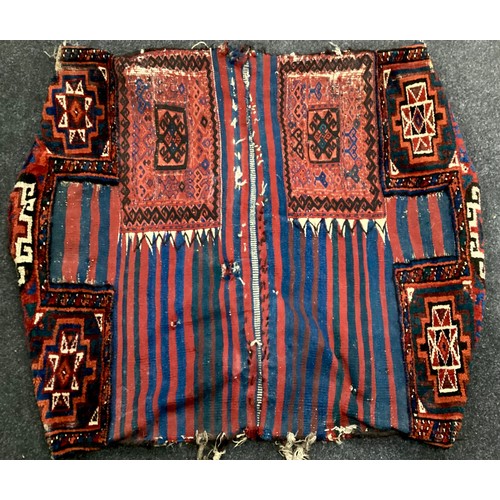 77 - Persian Lori or Qashgai type camel bag, Namakdan shaped panels, in tones of red and blue, 125cm x 10... 