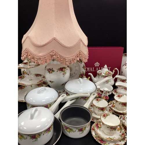 81 - A extensive Royal Albert ‘Old Countryroses’ table service for six comprised of; six dinner plates, s... 