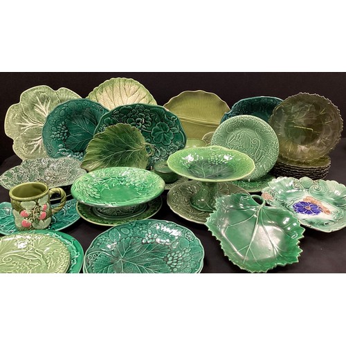 84 - Early 20th century and later majolica leaf plates, dishes, cake stands, beakers; etc