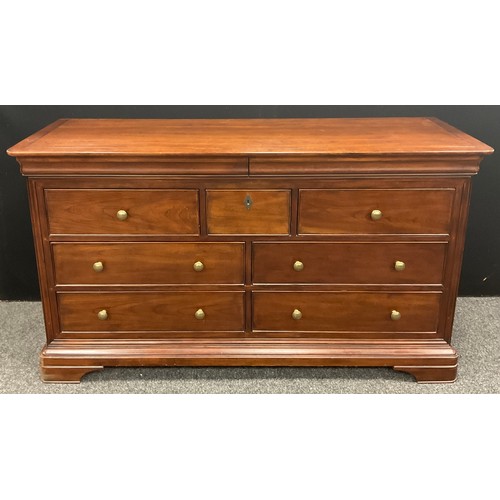 97 - A Willis and Gambier ‘Antoinette’ model (or similar) sideboard / large chest of drawers, the rounded... 