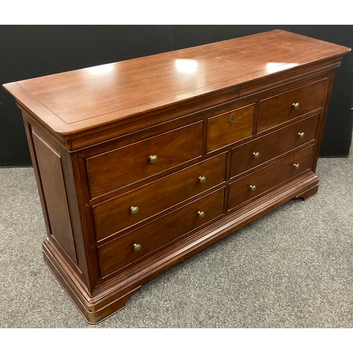 97 - A Willis and Gambier ‘Antoinette’ model (or similar) sideboard / large chest of drawers, the rounded... 