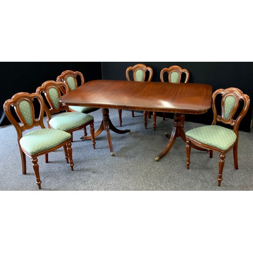 119 - A mahogany regency style D-end dining table by Reprodux furniture, and a set of six mahogany dining ... 