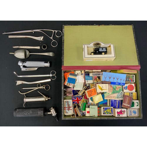 243 - Medical Instruments - an otoscope, laryngoscope, feeding/medicine spoon, syringe, long handle sissor... 