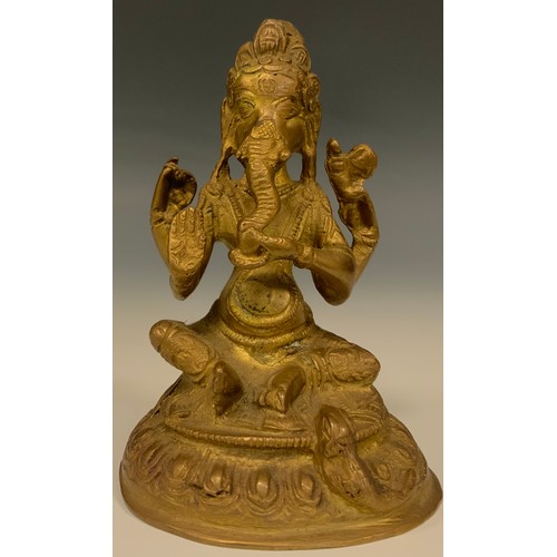 264 - An Indian gilt bronze, Ganesh