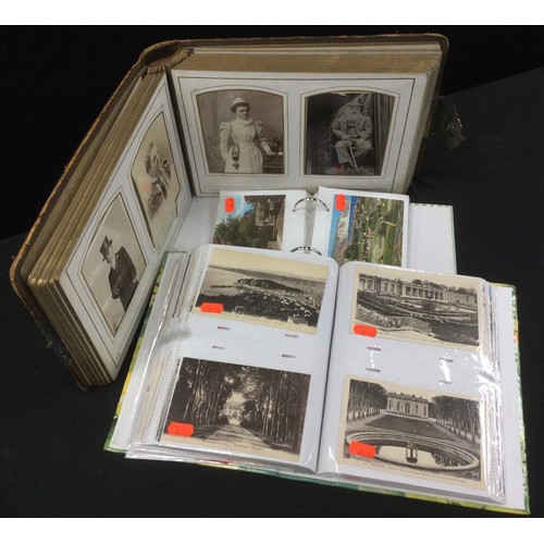 251A - Postcards & Ephemera - a Victorian and later photograph album, mostly portraits including Bandsman, ... 