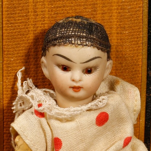 7159 - A bisque head and composition bodied miniature Oriental doll, probably by Simon & Halbig (Germany), ... 