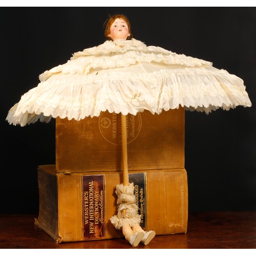 7161 - A Catterfelder Trautmann/Catterfelder Puppenfabrik (Germany) bisque head novelty parasol doll, the b... 