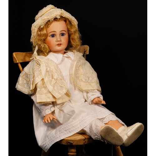 7163 - A Simon & Halbig (Germany) bisque head and painted composition bodied doll, the bisque head inset wi... 