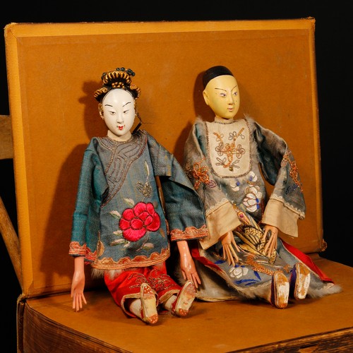 7164 - An early 20th century Chinese 'Opera' doll, the white painted composition head with painted features... 