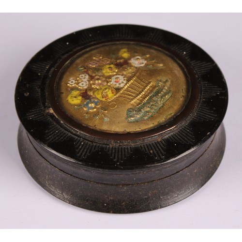 43 - An early 19th century pressed horn waisted circular snuff box, the push-fitting cover decorated in p... 