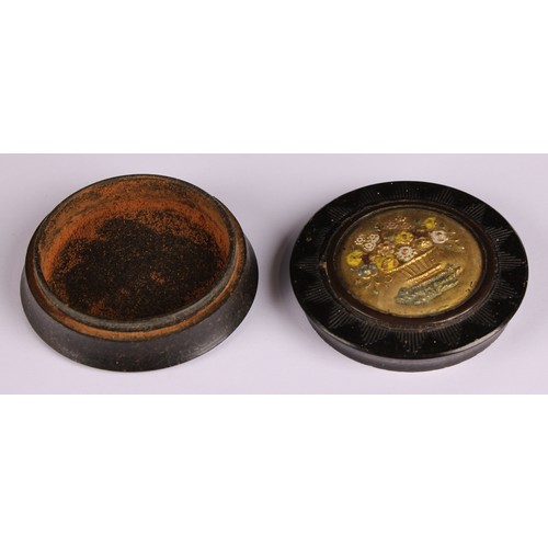 43 - An early 19th century pressed horn waisted circular snuff box, the push-fitting cover decorated in p... 