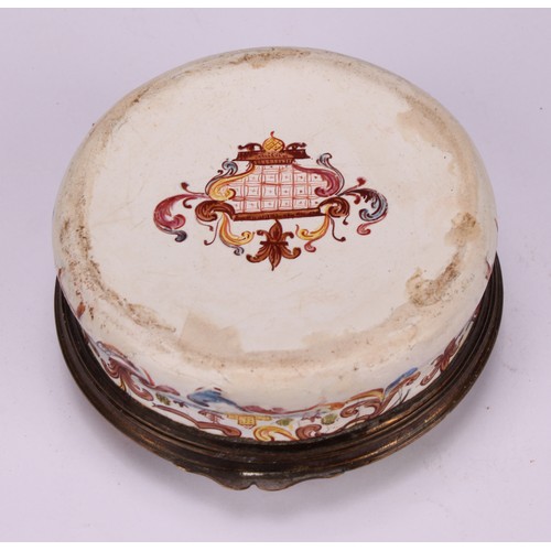 45 - A George III South Staffordshire enamel circular table snuff box, hinged cover painted with figures ... 