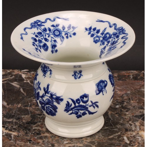 68 - A Worcester spittoon, the broad rim decorated in underglaze blue with Ribbon Root pattern, the sides... 