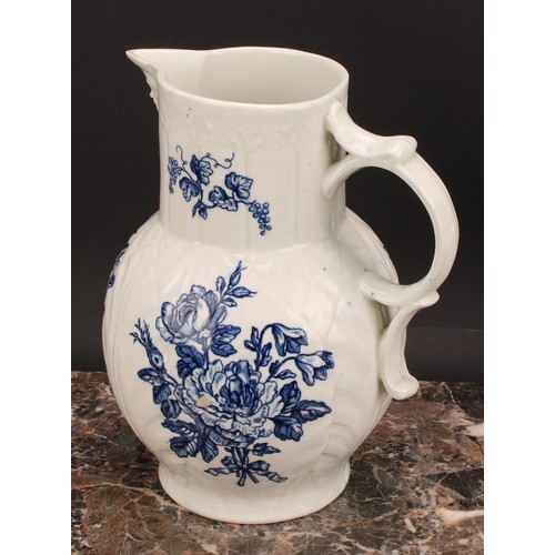 69 - A rare Worcester cabbage leaf jug, moulded with overlapping leaves, bearded mask spout, decorated in... 